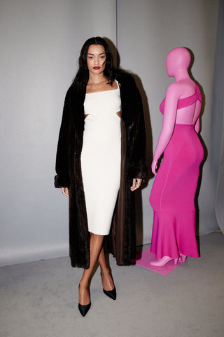 Lameka Fox wearing Dodiees’s square neck pencil dress in cream